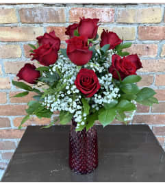 By Design Red Rose Splendour. An arrangement by Flowers By Design.
