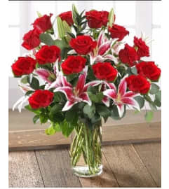 Stargazer Rose Elegance. An arrangement by Geni's Florist and Gifts. Stargazer Rose Elegance. An arrangement by Geni's Florist and Gifts.