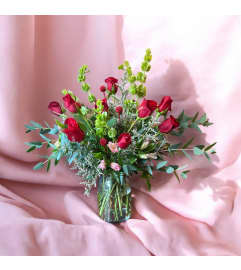 The Lady Luck Dozen. An arrangement by Vanessa's Flower Shop.