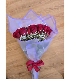 Wrapped Roses Bouquet. An arrangement by La Bolsa Rosa.