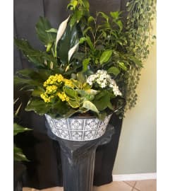 planter baskets. An arrangement by Flowers by Anna.