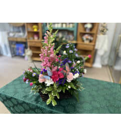 Butterfly Garden Basket. An arrangement by Bryan's Flowers and Gift Shop.