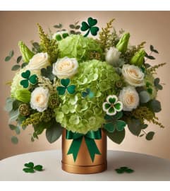 Pot O Gold. An arrangement by A Touch of Elegance Florist and Events LLC.