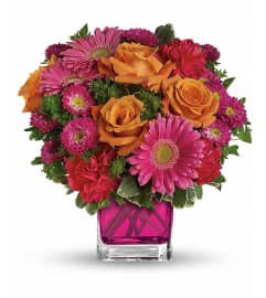 Turn Up The Pink Bouquet. An arrangement by Flowers and Beyond.