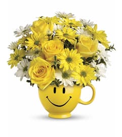 Be Happy® Bouquet with Roses. An arrangement by Flowers and Beyond.