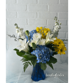 Sunshine and Sky. An arrangement by Brooklin Floral and Garden Shoppe Inc..