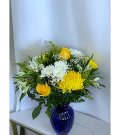 Sunshine and Snuggles. An arrangement by Roma James Gifts.