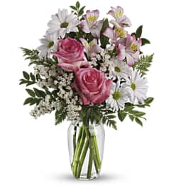What a Treat Bouquet with Roses. An arrangement by Love Floral.
