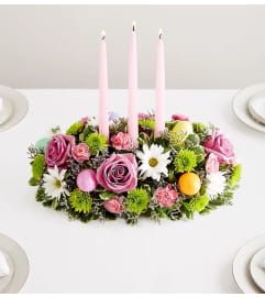 Easter Centerpiece By Elegant. An arrangement by Elegant Florist. Easter Centerpiece By Elegant. An arrangement by Elegant Florist.