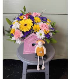 Blooming Birdhouse. An arrangement by In Bloom.