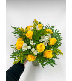 Dozen Yellow Roses. An arrangement by Mrs. Bee's Floral.