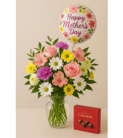 Radiant Rose Medley. An arrangement by Congers Florist.