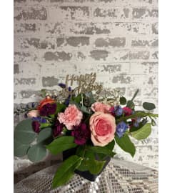 Twilight Petal Wishes. An arrangement by Kelly Ann's Floral.
