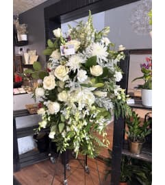 All White Remembrance Spray. An arrangement by Westdale Florist.