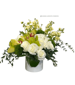 Pure Elegance Bloom. An arrangement by Angela's Red Flowers.