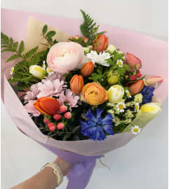 Spring Bouquet with Ranunculus. An arrangement by Avenida Flowers.