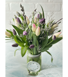 Two-tone Tulips. An arrangement by Brooklin Floral and Garden Shoppe Inc..