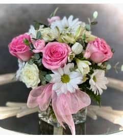 SIWF - She is so darling. An arrangement by Say It With Flowers.