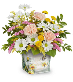Honey Kissed Bouquet (Teleflora). An arrangement by North Liberty Flower Shop.