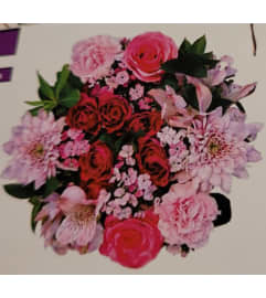 Mom's Day. An arrangement by Abundant Flowers and Gift Shoppe.