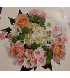 Peach Blush Harmony. An arrangement by Abundant Flowers and Gift Shoppe.