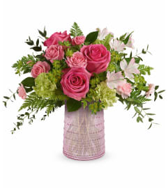 Sparkling Joy Bouquet (Teleflora). An arrangement by North Liberty Flower Shop.