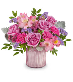 Teleflora's Enchanted Oasis Bouquet. An arrangement by Sueppel's Flowers.
