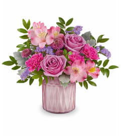 Enchanted Oasis Bouquet (Teleflora). An arrangement by North Liberty Flower Shop.