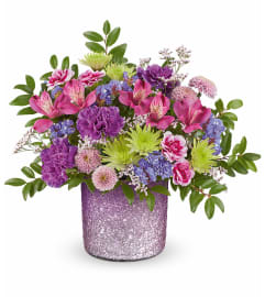 Jewel Garden Bouquet (Teleflora). An arrangement by North Liberty Flower Shop.