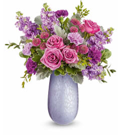 Vivi Bouquet (Teleflora). An arrangement by North Liberty Flower Shop.