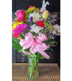 Springtime Cheer Bouquet. An arrangement by Howard Beach Florist.