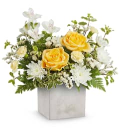 Contemporary Blossoms (Teleflora). An arrangement by North Liberty Flower Shop.
