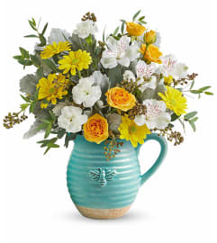 Bee Joyful Bouquet (Teleflora). An arrangement by North Liberty Flower Shop.