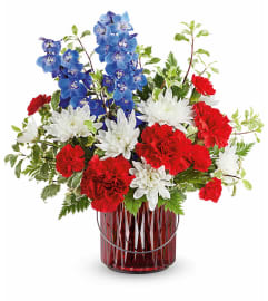 Elegant Blooms Bouquet (Teleflora). An arrangement by North Liberty Flower Shop.