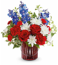 Elegant Blooms Bouquet (Teleflora). An arrangement by North Liberty Flower Shop.
