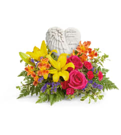 Forever In Bloom (Teleflora). An arrangement by North Liberty Flower Shop.