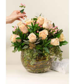 Peach Blossom Embrace. An arrangement by Gallery Flower Shop N Services.