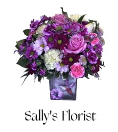 Sally’s Springtime Purple Bloom. An arrangement by Prime Florist.