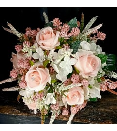 Blushing Grace SILK COMMUNION OR WEDDING Bouquet. An arrangement by Howard Beach Florist.