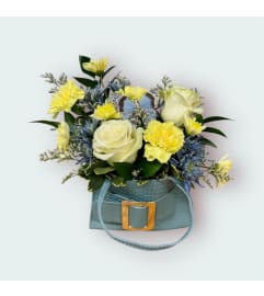 Blue Purse Blooming. An arrangement by In Bloom.