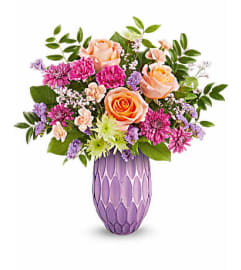 Pretty Glow. An arrangement by Palmetto Gardens Florist.