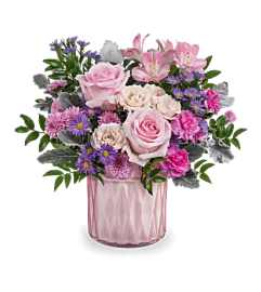 Teleflora's Dazzling Gem. An arrangement by Mae's Flowers and Gifts.
