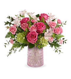 Teleflora's Sparkling Joy Bouquet. An arrangement by Mae's Flowers and Gifts.