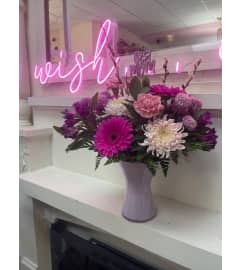 Floral Wish. An arrangement by wish etc..