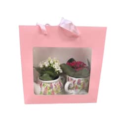 Chatelaine Mini Tea Set. An arrangement by Marianna's Flower Island.