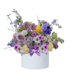 Mama Knows Best Box. An arrangement by Geni's Florist and Gifts.