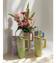 30oz Stainless Steel Tumbler with Designers choice Fresh Arrangem. An arrangement by New Montgomery Florist.