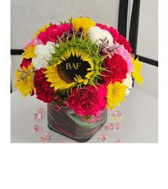Exclusive Colorful Cube. An arrangement by Brickell Ave Florist.