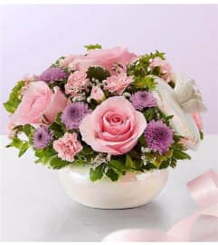 Mother's Pretty Pearl. An arrangement by Palmetto Gardens Florist.