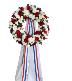 Patriotic Grace Wreath. An arrangement by Clark County Floral.